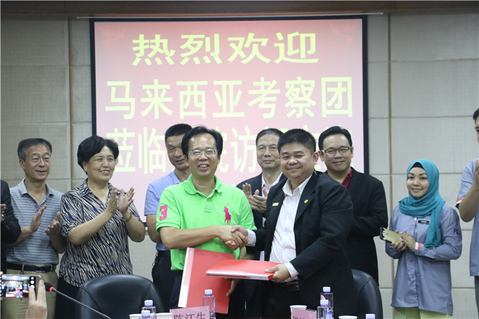 ��Ժ�����������й��羳����Э����к���ǩԼ��ʽ